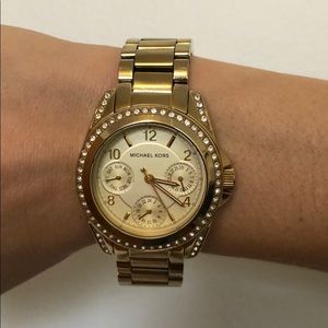 Michael Kors women’s gold watch